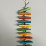 Colorful wooden blocks hanging on a chain.